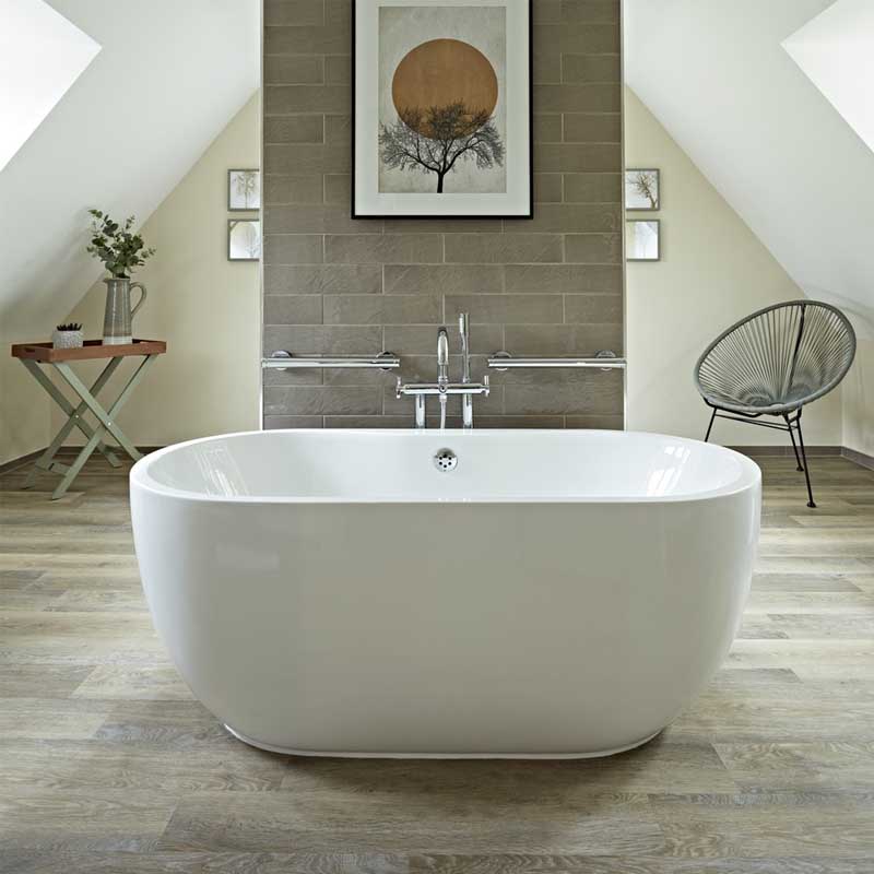 Freestanding roll top bath inside the Bigger Suite with wood burning stove