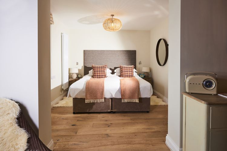 Cosy seating and lounge inside the Small Suite at The Fish Hotel